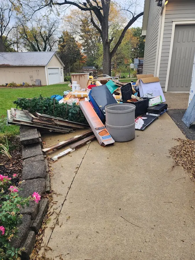Dumpster being loaded with debris for Residential Dumpster Rental in Tamalpais-Homestead Valley